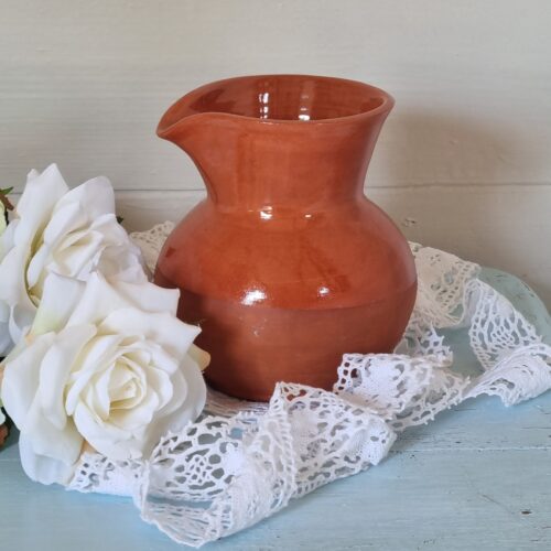 Sød lerkande uden hank i rødbrun glasur