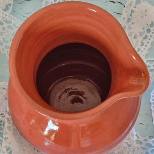 Sød lerkande uden hank i rødbrun glasur