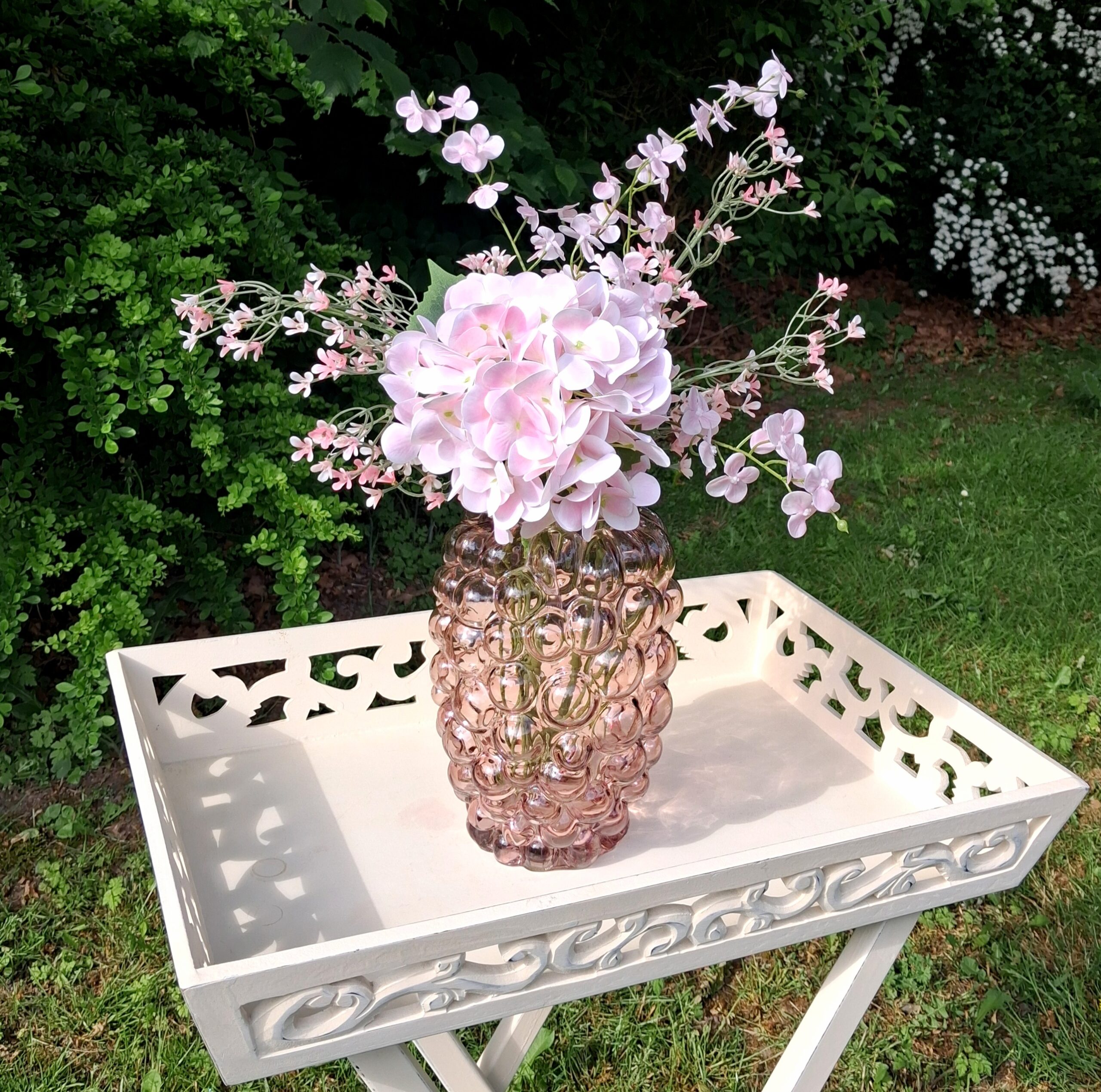 Fine blomster i den smukke glasvase